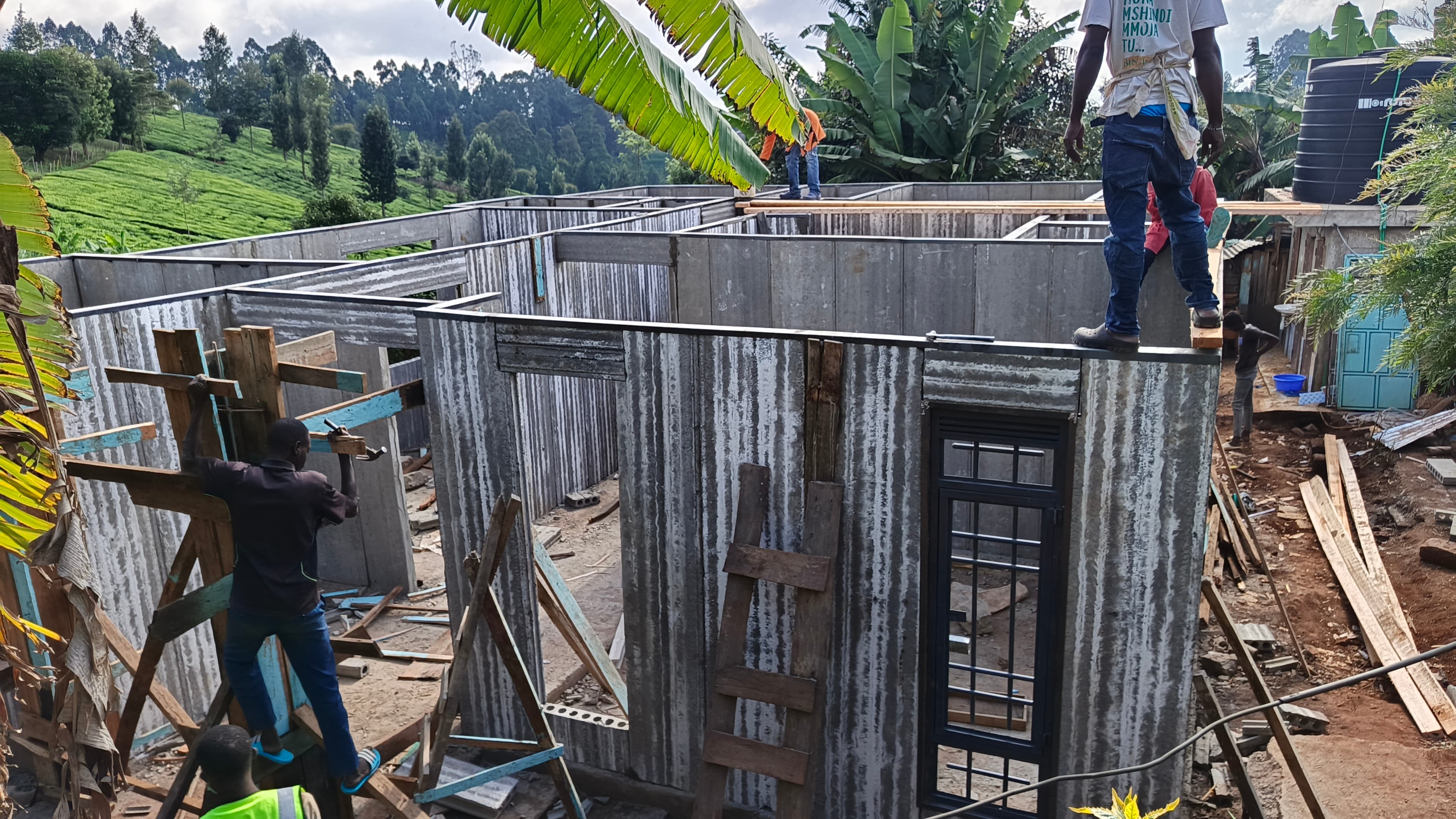 Gedo Holdings crew fixing the timber wall-plate onto precast concrete wall panels