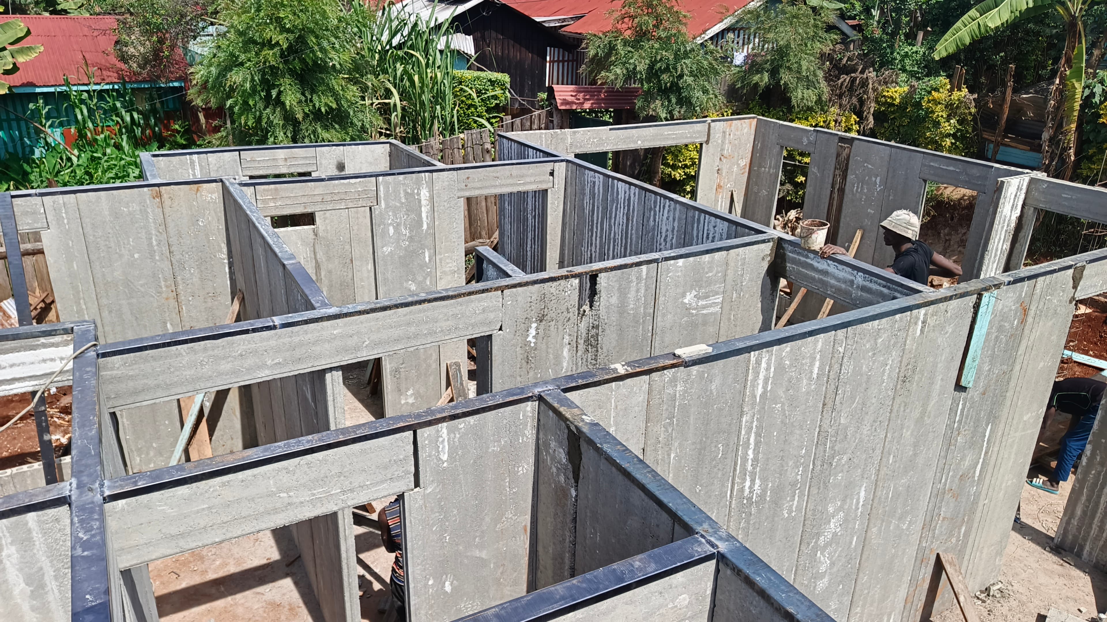 Aerial view of precast wall panels and steel lintels forming a new Gedo Holdings home in Kenya