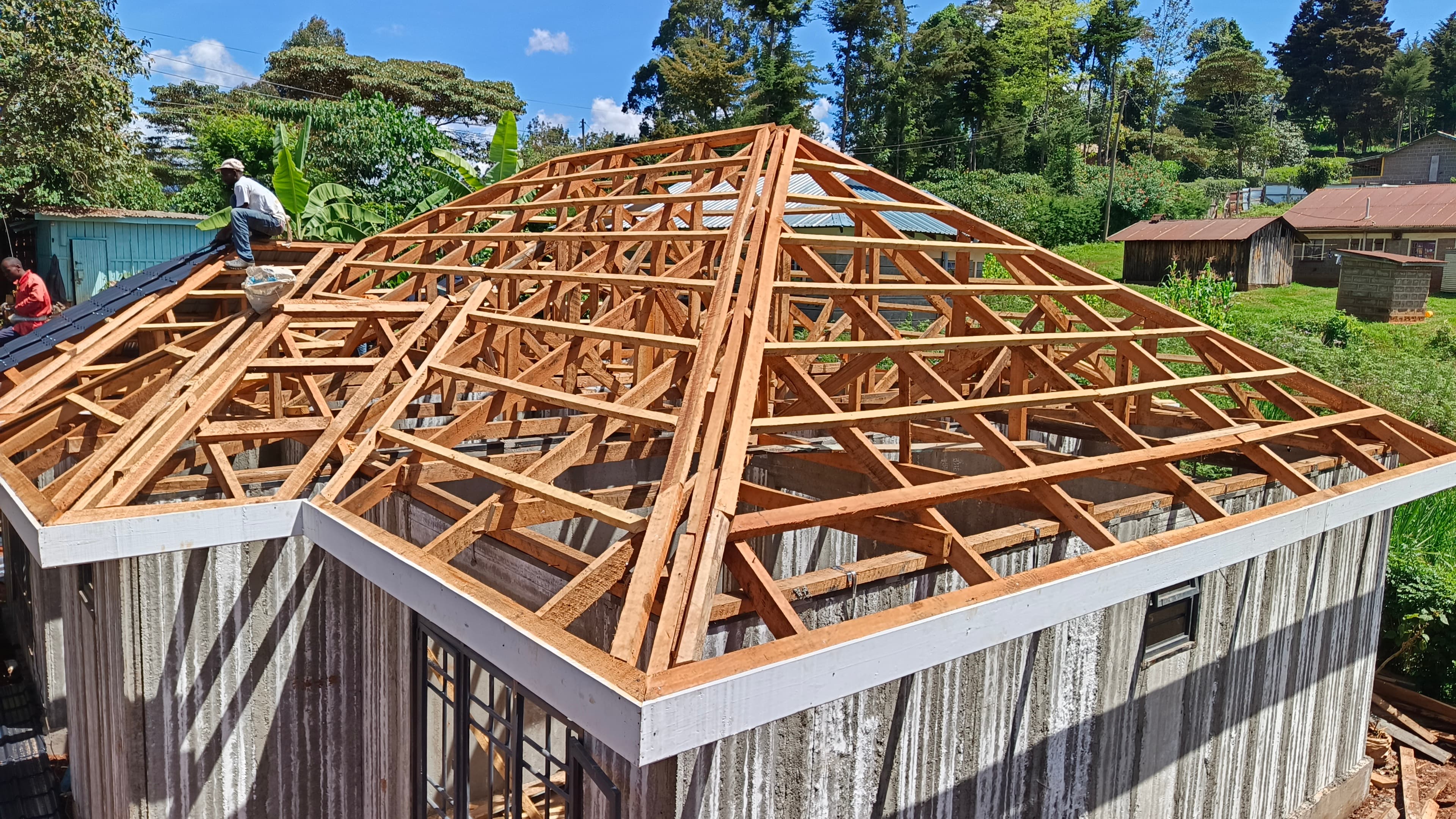 Timber roof trusses installed on a completed precast concrete wall shell by Gedo Holdings